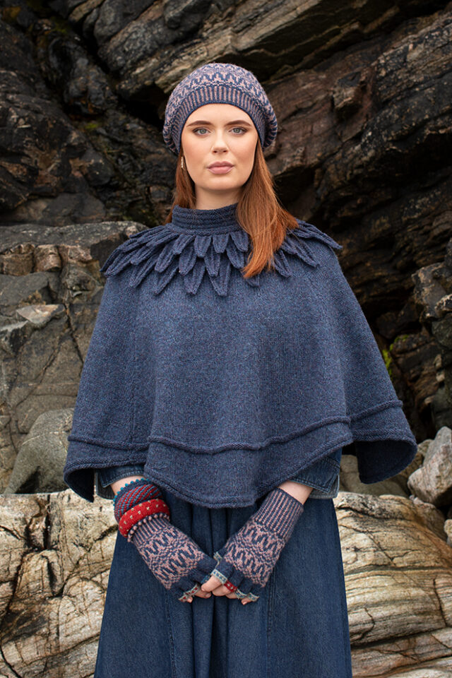 The Raven Poncho and Hirta Hat Set patterncard kit designs by Alice Starmore in Hebridean 2 & 3 Ply and a cuff from Creative Course 2