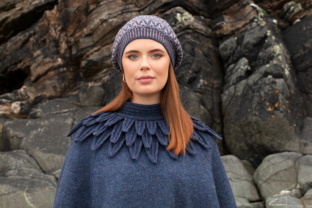 The Raven Poncho and Hirta Hat Set patterncard kit designs by Alice Starmore in Hebridean 2 & 3 Ply and a cuff from Creative Course 2