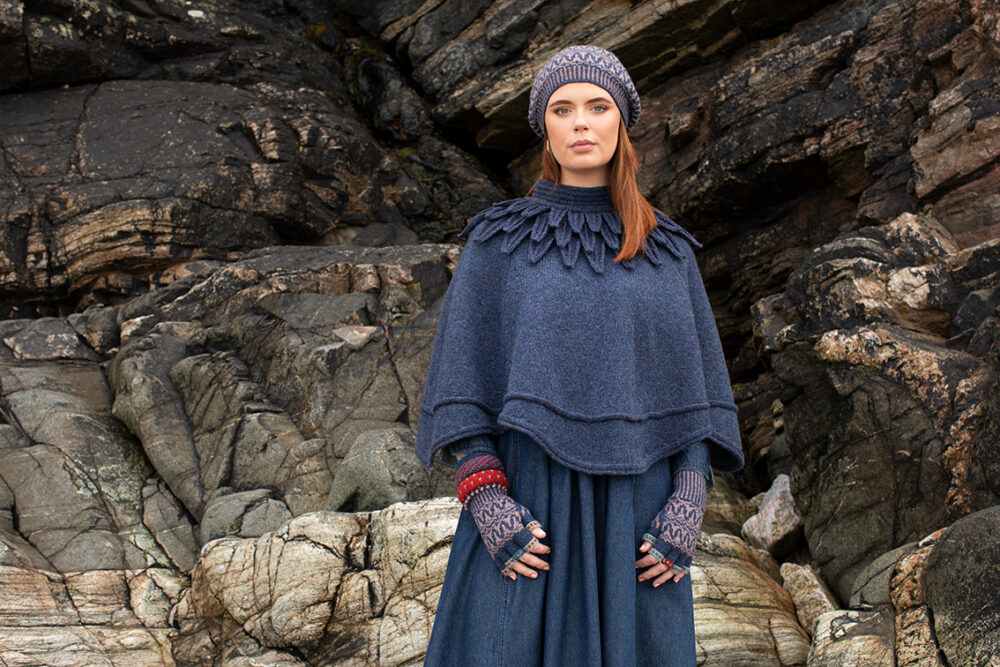 The Raven Poncho and Hirta Hat Set patterncard kit designs by Alice Starmore in Hebridean 2 & 3 Ply and a cuff from Creative Course 2