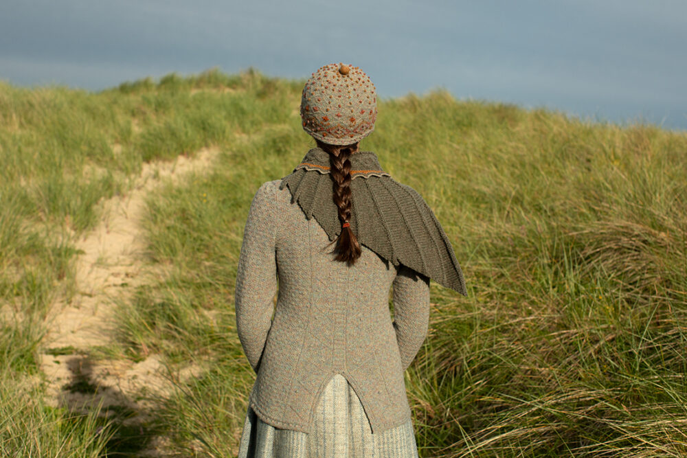 The Eagle Wrap and Mountain Hare Jacket & Hat patterncard kit designs by Alice Starmore in Hebridean 2 & 3 Ply