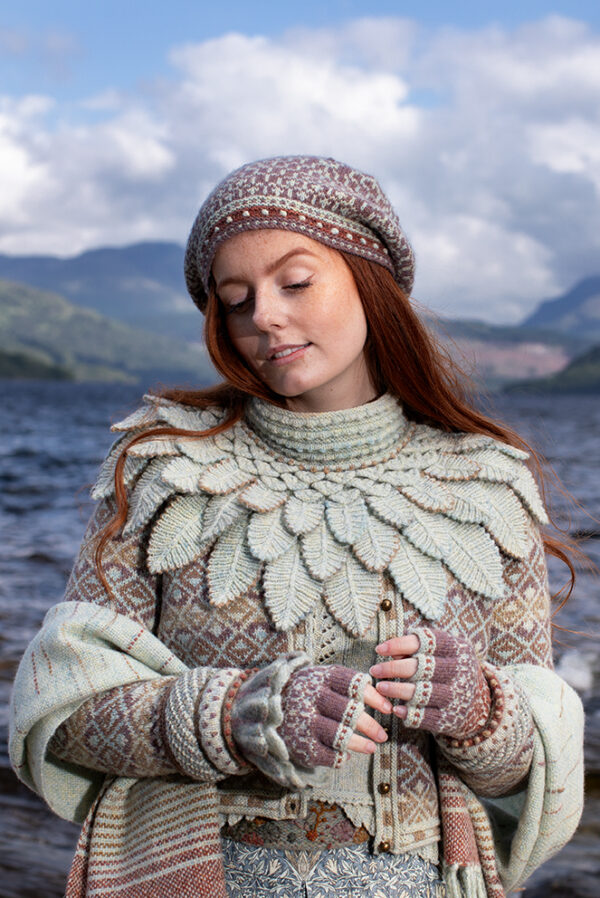 The Sulaire Spencer, Eagle Collar, Briodag Hat Set patterncard kit designs by Alice Starmore, Delta Cardigan patterncard kit design by Jade Starmore Cuff from Creative Course 2 and Belt from Creative Course 3, all in Hebridean 2 Ply
