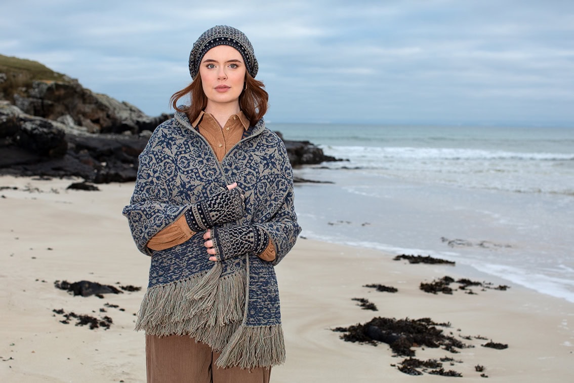 Persian Tiles patterncard kit design by Jade Starmore and the Rosemarkie waistcoat and Briodag Hat and Gloves patterncard kit designs by Alice Starmore, knitted in Hebridean 2 Ply